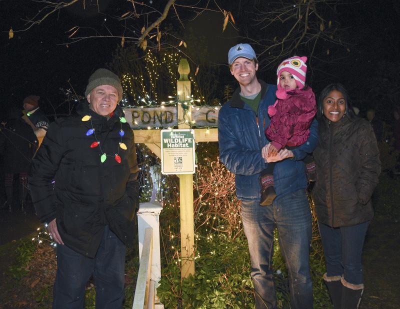 Michael Zajic, left, welcomes Collin O’Mara, CEO of the National Wildlife Federation, and his daughter Alana and wife Krish.